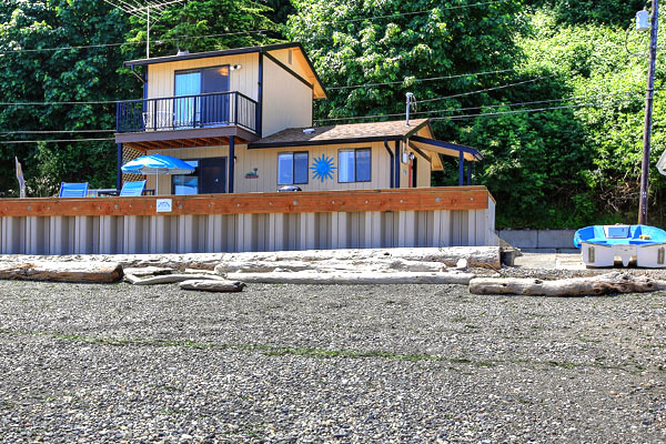 The Beach House at Tyee on Camano Island is located on a welcoming sand and gravel beach.